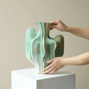 Abstract mint & olive ceramic vase with irregular folds living room