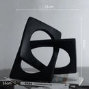 Abstract white ceramic geometric cross square ring bookends living room