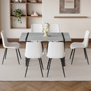 Table and chair set. Modern minimalist grey marble textured MDF dining table with metal frame. Comes with 6 chairs with PU cushions and black metal legs.