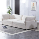 The 112-inch beige corduroy sofa, with two throw pillows and four backrests, has opened up a new style for the living room's leisure area