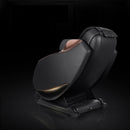 Black massage chair on a dark background
