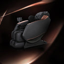 Black massage chair with brown accents on a dark background