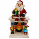 Santa Sitting on a Fireplace LED Lights Figurine 7.75 Inches