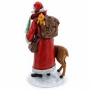 Santa Holding Christmas Tree and Bell by Reindeer Figurine 12 Inches