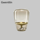 Amber glass and brass led table lamp for bedroom lighting
