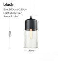 Amber glass and natural wood pendant light fixture for dining room