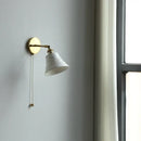 Antique brass and amber glass adjustable wall light bedroom sconce