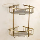 Antique brass bathroom set with ornate mounts and ceramic brush cup
