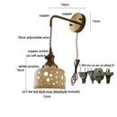 Antique brass ceramic led wall sconce with floral shade for bedroom