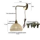 Antique brass ceramic led wall sconce with floral shade for bedroom