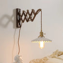 Antique brass ceramic walnut wall sconce with scalloped shade bedroom