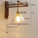 Antique brass ceramic walnut wall sconce with scalloped shade bedroom