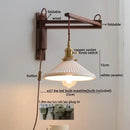 Antique brass ceramic walnut wall sconce with scalloped shade bedroom