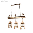 DecorBites™ Antique Brass Lantern Pendant with Clear Glass and Bird Accent - 3-Light Coastal Island Kit