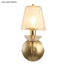 Antique brass conical sconce light with clear twisted glass bedroom