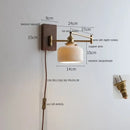 Antique brass industrial wall light with clear glass for bedroom