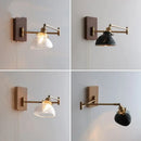Antique brass industrial wall light with clear glass for bedroom