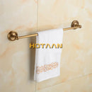 Antique brass single towel bar with ornate base for bathroom decor