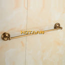 Antique brass single towel bar with ornate base for bathroom decor