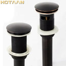 Antique brass sink drain with white rubber seal – bathroom waste