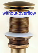 Antique brass sink drain with white rubber seal – bathroom waste