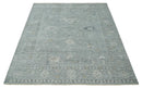 Distressed finished 8x10 Gray and Silver Low Pile wool Rug