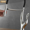Arched brushed nickel kitchen faucet with black rubberized hose