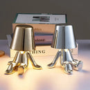 Articulated golden man table lamp for bedroom night light