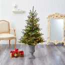 56” North Carolina Spruce Artificial Christmas Tree with 100 Clear Lights and 207 Bendable Branches in Decorative Urn