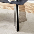 Table and chair set.63'x31.5x30' Black Marble-Patterned Slabs Tabletop with Stainless Steel Butterfly Legs.Paired with 4 white PU dining chairs with a vertical stripe design on the backrest.