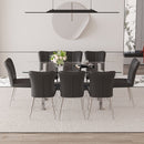 Table and chair set.Elegant Transparent Tempered Glass Dining Set - 71'x35.4' with 8 Black PU Chairs with a vertical stripe design on the backrest.