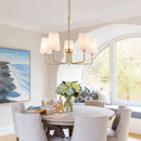 Five Light Gilded Farmhouse Chandelier With White Shades