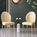 Beige pleated upholstered dining set with gold legs dining room