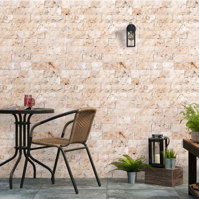 Beige 4"xFree Length Split-face Natural Travertine Wall Tile - Belair Collection installed outdoor wall table and chair