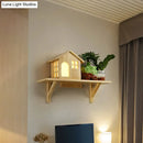 Beige wooden house wall sconce with storage shelf and warm white light