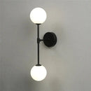 Black and gold glass wall lamp bedroom dual globe sconce