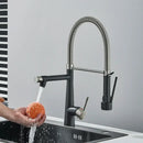 Black and stainless steel kitchen faucet with flexible spout