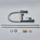 Black and stainless steel kitchen faucet with flexible spout