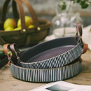 Black and white striped porcelain bowl with leather handle dining room