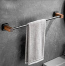 Black and wood bathroom hardware set with storage shelf
