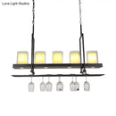Traditional black island light fixture with wine glass holders kitchen