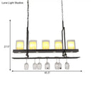 Traditional black island light fixture with wine glass holders kitchen