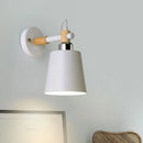 Black matte wall lamp with empire shade and wood arm for stairs