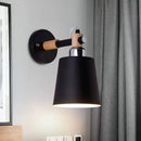Black matte wall lamp with empire shade and wood arm for stairs