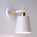 Black matte wall lamp with empire shade and wood arm for stairs
