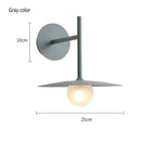 Black minimalist glass ball wall lamp – bedroom sconce