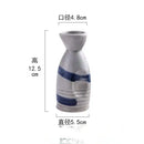 Black speckled ceramic wine sake set with heater for dining room