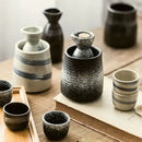 Black speckled ceramic wine sake set with heater for dining room