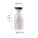 Black speckled ceramic wine sake set with heater for dining room