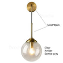 Brass amber glass ball wall light for bedroom and living room
